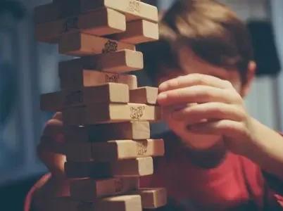 Children playing Jenga during therapy